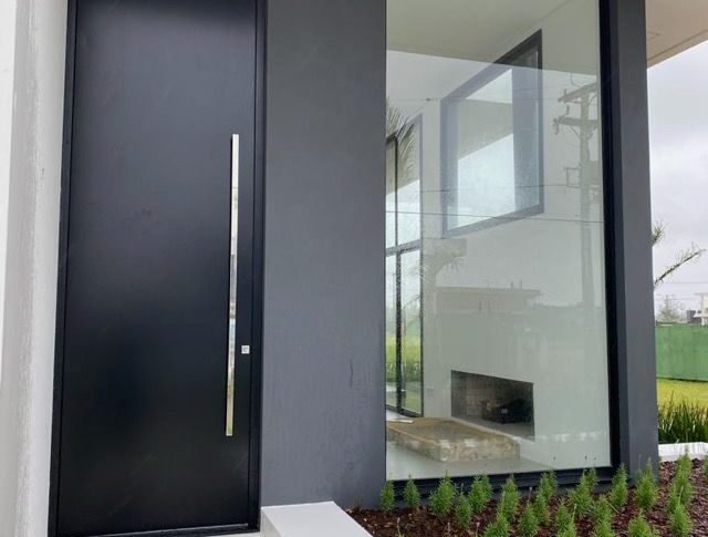PORTA PIVOTANTE EM ACM